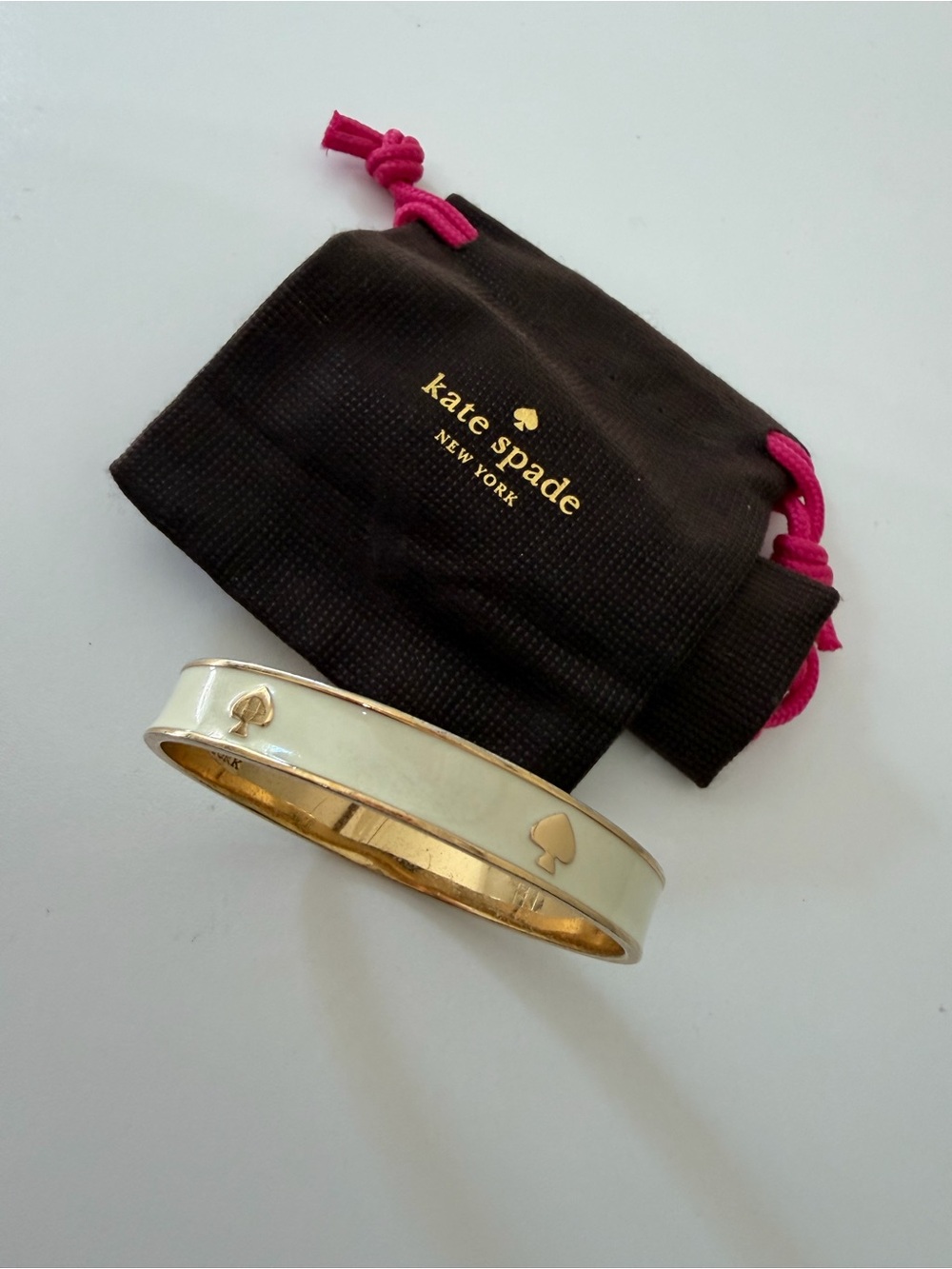 kate spade Cream and Gold Enamel Spade Bangle Bracelet